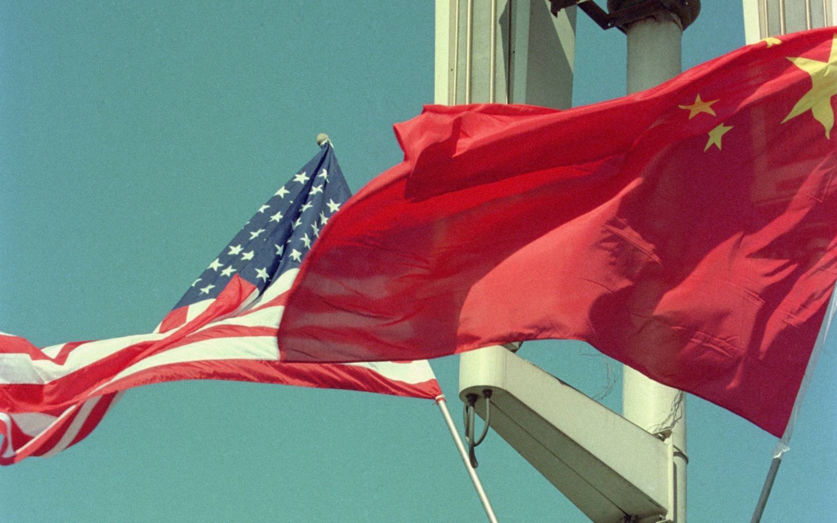 Chinese and American flags flying over the area around Tiananmen Square, 2002.