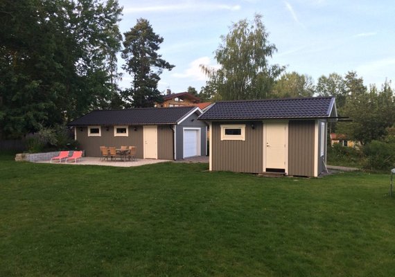 Double matching sheds with garage port
