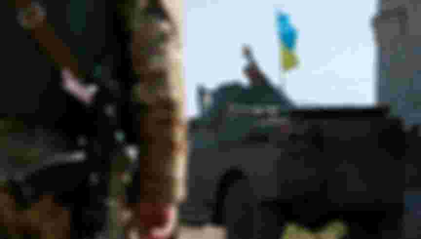 A Ukrainian serviceman rides in an armoured vehicle near Donetsk September 2, 2014. Credit: REUTERS / Alamy Stock Photo.