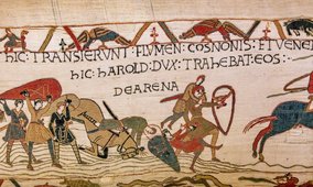 Scene of the Battle of Hastings, depicted on the Bayeux Tapestry. Credit: isogood