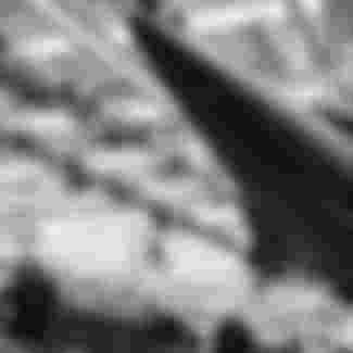 A conveyor line assembling US Army Nike Hercules Missiles, 1958. Credit: RBM Vintage Images / Alamy Stock Photo.