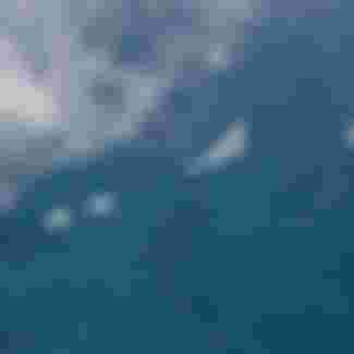 Two US Air Force B-2 Spirits fly alongside four Royal Australian Air Force EA-18G Growlers and a RAAF E-7A Wedgetail, August 2022.