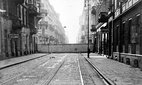 Photograph of a wall encircling the Jewish ghetto in Warsaw, Poland.