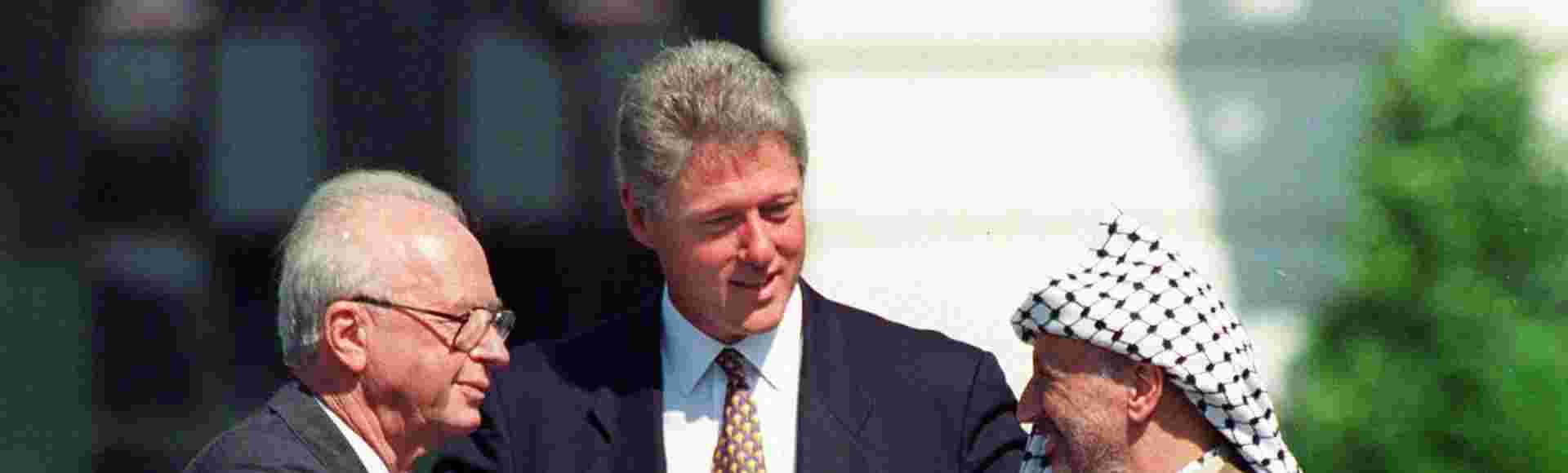 Yitzhak Rabin shakes hands with Yasser Arafat on the South Lawn of the White House following the signing of the Oslo Accords in 1993.