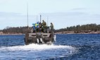 A Swedish ship partakes in a naval exercise by Götland.