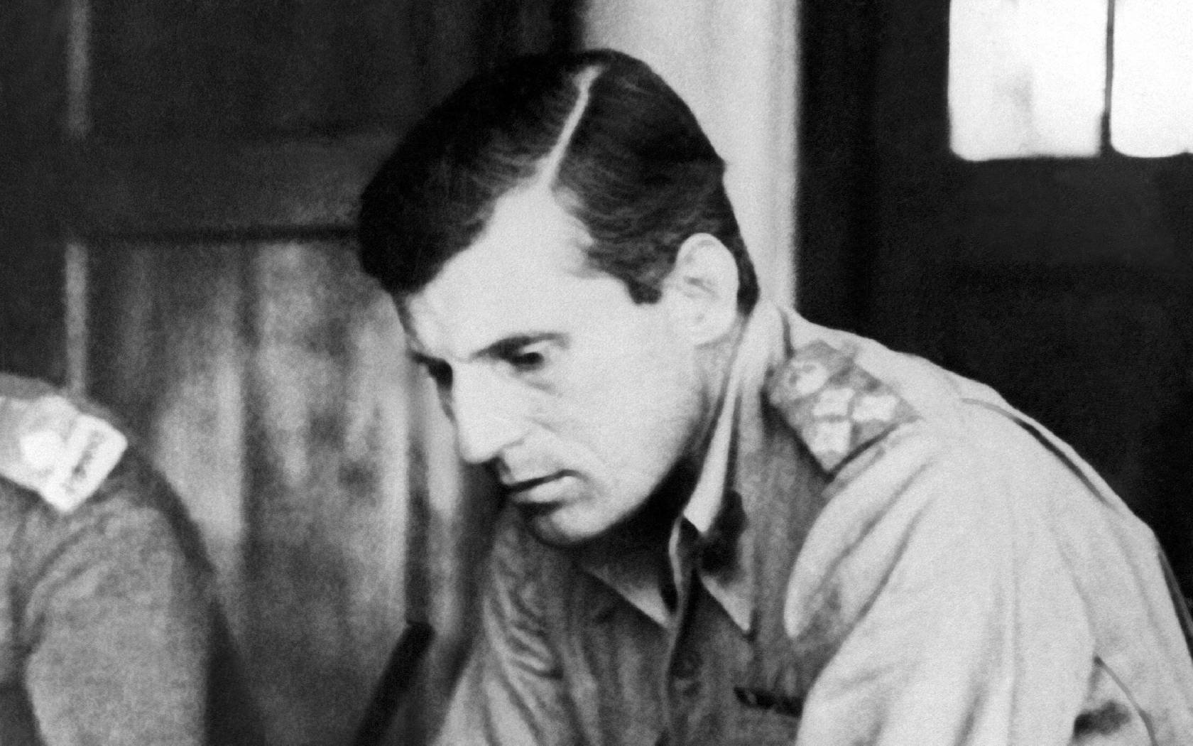 Brigadier Charles Orde Wingate checks his route before leading a force of British and native troops behind Japanese lines.