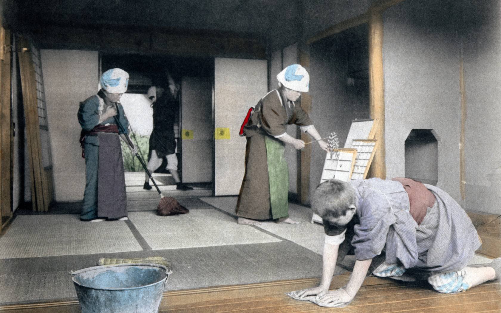 A Japanese family cleans the home in advance of New Year celebrations.